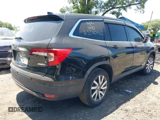 2019 Honda Pilot EX-L with VIN 5FNYF6H52KB006469, listed as a IAAI auction lot 42103135 with 12,757 mi miles and . Bid and sale history available at DreamBid. Image 4.