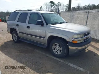 2005 Chevrolet Tahoe LS with VIN 1GNEC13V85R240613, listed as a IAAI auction lot 41676860 with 242,846 mi miles. Bid and sale history available at carsss.com. Image 1.