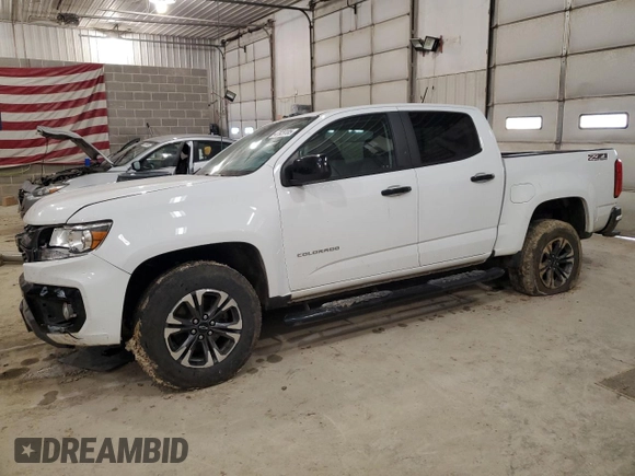 2021 Chevrolet Colorado 4WD Z71 with VIN 1GCGTDEN4M1214359, listed as a Copart auction lot 47929185 with 77,084 mi miles and Salvage title. Bid and sale history available at DreamBid. Image 1.