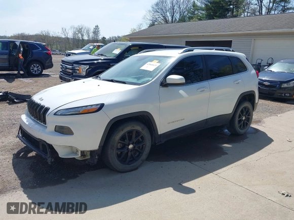 2015 Jeep Cherokee Latitude with VIN 1C4PJLCS3FW670254, listed as a IAAI auction lot 42060659 with 164,291 mi miles. Bid and sale history available at carsss.com. Image 2.