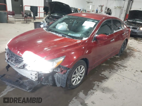 2016 Nissan Altima 2.5 S with VIN 1N4AL3AP7GN385617, listed as a IAAI auction lot 41317018 with 112,238 mi miles. Bid and sale history available at carsss.com. Image 2.