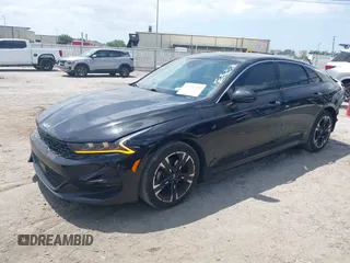 2022 Kia K5 GT-Line z VIN 5XXG64J29NG164454, wystawiony jako IAAI lot #42102282 z przebiegiem 43 367 mil mil oraz . Historia ofert i sprzedaży dostępna na DreamBid. Obrazek 18.