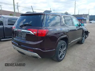 2017 GMC Acadia Denali with VIN 1GKKNPLS6HZ311086, listed as a IAAI auction lot 42440540 with 49,948 mi miles and . Bid and sale history available at DreamBid. Image 4.