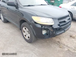 2009 Hyundai Santa Fe GLS with VIN 5NMSG13D69H279184, listed as a IAAI auction lot 41944760 with 242,065 mi miles. Bid and sale history available at carsss.com. Image 6.