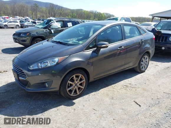 2015 Ford Fiesta SE with VIN 3FADP4BJ6FM105731, listed as a IAAI auction lot 41994903 with 150,189 mi miles. Bid and sale history available at carsss.com. Image 2.