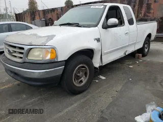 2000 Ford F-150 XL with VIN 1FTRX17L5YKA74815, listed as a Copart auction lot 85821444 with 0 mi miles and Salvage Title. Bid and sale history available at carsss.com. Image 1.
