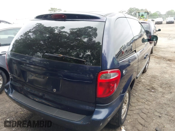 2005 Dodge Caravan SXT with VIN 1D4GP45RX5B416600, listed as a IAAI auction lot 42113088 with 312,418 mi miles and . Bid and sale history available at DreamBid. Image 4.