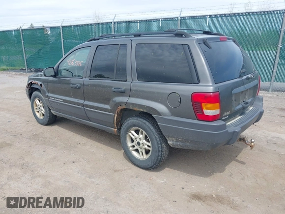 2004 Jeep Grand Cherokee Laredo z VIN 1J4GW48S34C399804, wystawiony jako IAAI lot #42163326 z przebiegiem 203 278 mil mil oraz . Historia ofert i sprzedaży dostępna na DreamBid. Obrazek 3.