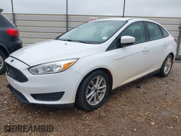 2018 Ford Focus SE z VIN 1FADP3F23JL225333, wystawiony jako IAAI lot #41758445 z przebiegiem 133 307 mil mil oraz . Historia ofert i sprzedaży dostępna na DreamBid. Obrazek 17.