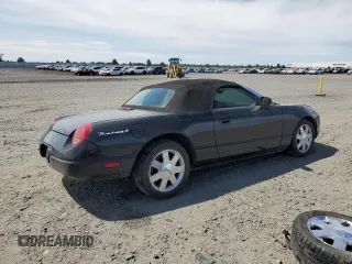 2002 Ford Thunderbird Hardtop Premium z VIN 1FAHP60A92Y117614, wystawiony jako Copart lot #59344735 z przebiegiem 83 723 mil mil oraz Szkoda całkowita • Salvage title. Historia ofert i sprzedaży dostępna na DreamBid. Obrazek 3.
