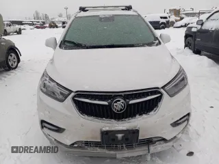 2019 Buick Encore Essence with VIN KL4CJGSM5KB738932, listed as a Copart auction lot 83087444 with 59,162 mi miles and Salvage Title. Bid and sale history available at DreamBid. Image 5.