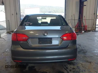 2014 Volkswagen Jetta Sedan S with VIN 3VW2K7AJ5EM410491, listed as a IAAI auction lot 42083614 with 65,960 mi miles. Bid and sale history available at carsss.com. Image 17.