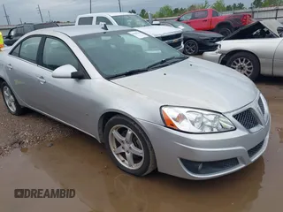 2009 Pontiac G6 1SB z VIN 1G2ZJ57K094243360, wystawiony jako IAAI lot #41904278 z przebiegiem 144 346 mil mil oraz . Historia ofert i sprzedaży dostępna na DreamBid. Obrazek 1.