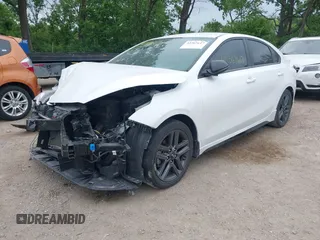 2021 Kia Forte GT-Line z VIN 3KPF34AD9ME333644, wystawiony jako IAAI lot #42367617 z przebiegiem 58 791 mil mil oraz . Historia ofert i sprzedaży dostępna na DreamBid. Obrazek 6.