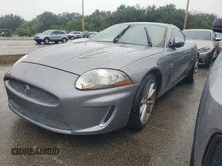2010 Jaguar XK with VIN SAJWA4DC7AMB34148, listed as a Copart auction lot 74837624 with 0 mi miles and Salvage Title. Bid and sale history available at carsss.com. Image 1.
