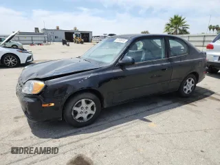 2003 Hyundai Accent GL z VIN KMHCG35C33U258812, wystawiony jako Copart lot #57509245 z przebiegiem 153 716 mil mil oraz Szkoda całkowita • Salvage title. Historia ofert i sprzedaży dostępna na DreamBid. Obrazek 1.