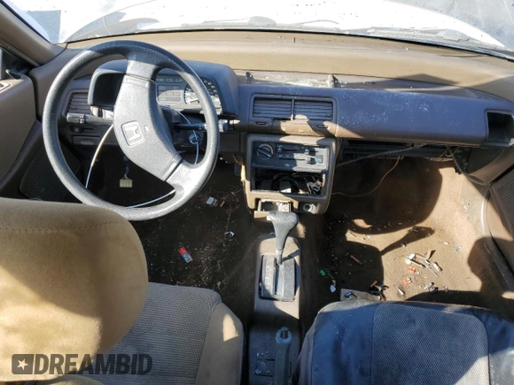 1989 Honda Civic z VIN JHMED6451KS002428, wystawiony jako Copart lot #86497404 z przebiegiem 241 207 mil mil oraz Szkoda całkowita • Salvage title. Historia ofert i sprzedaży dostępna na DreamBid. Obrazek 8.