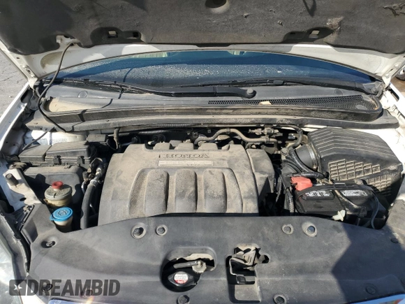 2005 Honda Odyssey EX-L with VIN 5FNRL38785B041017, listed as a Copart auction lot 52191965 with 211,949 mi miles and Salvage Title. Bid and sale history available at carsss.com. Image 12.