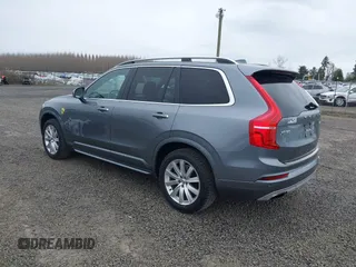 2016 Volvo XC90 T6 Momentum z VIN YV4A22PK7G1033452, wystawiony jako IAAI lot #41884004 z przebiegiem 78 734 mil mil oraz . Historia ofert i sprzedaży dostępna na DreamBid. Obrazek 3.