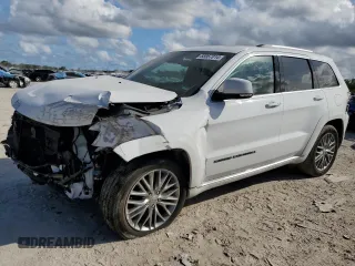2018 Jeep Grand Cherokee Summit with VIN 1C4RJEJG6JC358829, listed as a Copart auction lot 85957014 with 76,084 mi miles and Salvage title. Bid and sale history available at DreamBid. Image 1.