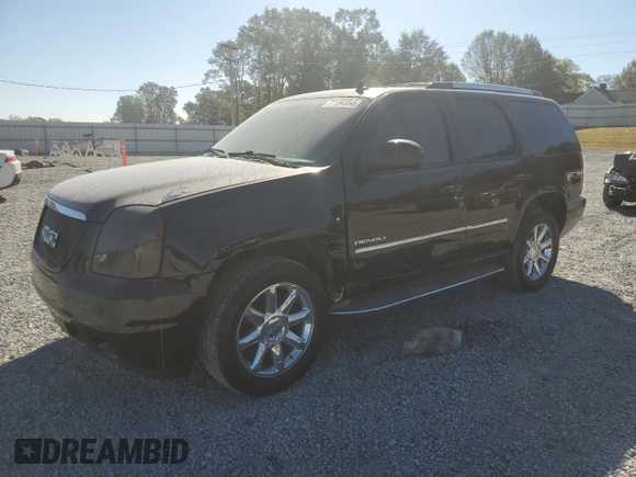 2011 GMC Yukon Denali with VIN 1GKS1EEFXBR121055, listed as a Copart auction lot 77194354 with 98,806 mi miles and Salvage Title. Bid and sale history available at carsss.com. Image 1.