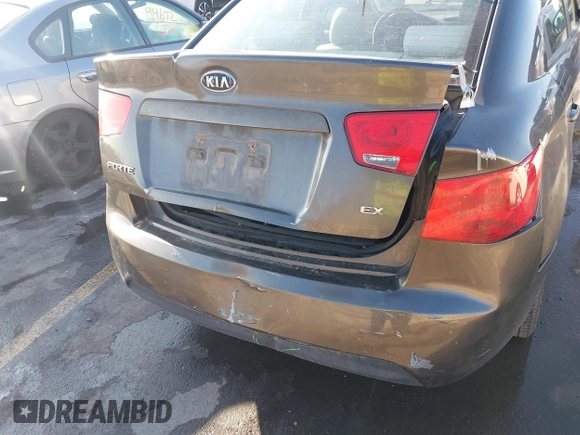 2011 Kia Forte EX with VIN KNAFU4A25B5358977, listed as a IAAI auction lot 40992404 with 137,478 mi miles. Bid and sale history available at carsss.com. Image 12.