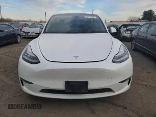 2023 Tesla Model Y Long Range with VIN 7SAYGDEE3PA130988, listed as a Copart auction lot 42172185 with 112,136 mi miles and Salvage Title. Bid and sale history available at DreamBid. Image 5.