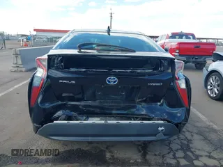 2017 Toyota Prius Two with VIN JTDKARFUXH3040763, listed as a IAAI auction lot 42041831 with 120,063 mi miles. Bid and sale history available at carsss.com. Image 6.