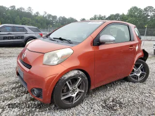 2012 Scion iQ with VIN JTNJJXB07CJ017816, listed as a Copart auction lot 59616355 with 141,384 mi miles and Salvage title. Bid and sale history available at DreamBid. Image 1.