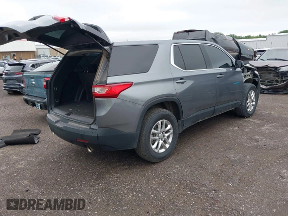 2020 Chevrolet Traverse LS with VIN 1GNERFKW8LJ185193, listed as a IAAI auction lot 42087348 with 100,762 mi miles and . Bid and sale history available at DreamBid. Image 4.