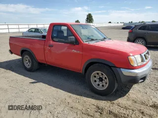 1998 Nissan Frontier XE with VIN 1N6DD21S2WC364538, listed as a Copart auction lot 62867545 with 261,987 mi miles and Salvage title. Bid and sale history available at DreamBid. Image 4.