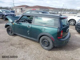 2010 MINI Cooper Clubman with VIN WMWML3C57ATX51076, listed as a IAAI auction lot 41931760 with 80,970 mi miles. Bid and sale history available at carsss.com. Image 3.