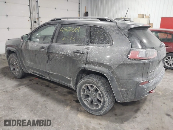 2021 Jeep Cherokee Trailhawk z VIN 1C4PJMBX4MD148597, wystawiony jako IAAI lot #41622099 z przebiegiem 48 452 mil mil oraz . Historia ofert i sprzedaży dostępna na DreamBid. Obrazek 3.