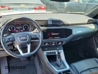 2023 Audi Q3 S line Premium with VIN WA1DECF37P1081194, listed as a IAAI auction lot 42796405 with 58,808 mi miles and . Bid and sale history available at DreamBid. Image 31.