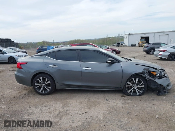 2018 Nissan Maxima SV with VIN 1N4AA6AP4JC377985, listed as a IAAI auction lot 42071678 with 104,326 mi miles and . Bid and sale history available at DreamBid. Image 12.