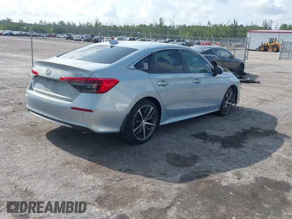 2023 Honda Civic Touring with VIN 2HGFE1F91PH305053, listed as a IAAI auction lot 42378311 with 41,576 mi miles and . Bid and sale history available at DreamBid. Image 4.