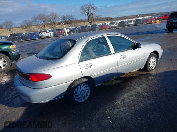 1999 Ford Escort SE z VIN 1FAFP13P8XW185612, wystawiony jako IAAI lot #41097304 z przebiegiem 221 752 mil mil oraz . Historia ofert i sprzedaży dostępna na DreamBid. Obrazek 4.