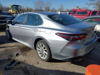 2023 Toyota Camry LE z VIN 4T1C11AK1PU771615, wystawiony jako IAAI lot #41679085 z przebiegiem 20 230 mil mil oraz . Historia ofert i sprzedaży dostępna na DreamBid. Obrazek 3.
