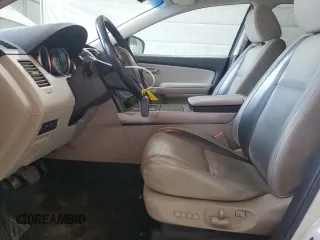 2010 Mazda CX-9 Grand Touring z VIN JM3TB3MV1A0216883, wystawiony jako Copart lot #53688975 z przebiegiem 175 158 mil mil oraz Szkoda całkowita • Salvage title. Historia ofert i sprzedaży dostępna na DreamBid. Obrazek 7.