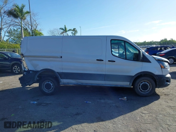 2023 Ford Transit Cargo with VIN 1FTBR1Y81PKB93787, listed as a IAAI auction lot 41253973 with 16,058 mi miles and . Bid and sale history available at DreamBid. Image 14.