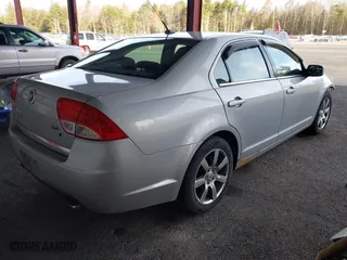2010 Mercury Milan Premier with VIN 3MEHM0JG9AR643692, listed as a IAAI auction lot 41870580 with 122,284 mi miles. Bid and sale history available at carsss.com. Image 4.