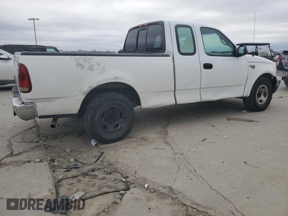 2000 Ford F-150 XL with VIN 1FTRX17W7YNB87528, listed as a Copart auction lot 88470995 with 0 mi miles and Salvage Title. Bid and sale history available at carsss.com. Image 3.