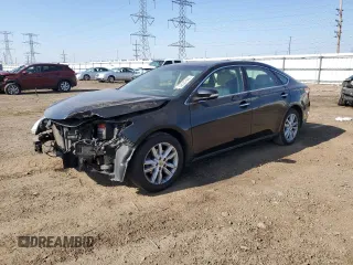 2013 Toyota Avalon XLE with VIN 4T1BK1EB1DU055523, listed as a Copart auction lot 52527445 with 139,107 mi miles and Salvage Title. Bid and sale history available at DreamBid. Image 1.