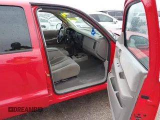 2004 Dodge Dakota Sport with VIN 1D7HL38KX4S657177, listed as a IAAI auction lot 41534575 with 38,802 mi miles. Bid and sale history available at carsss.com. Image 5.
