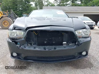 2013 Dodge Charger Police с VIN 2C3CDXAG1DH521921, выставлен на аукционе IAAI как лот 42504902 с пробегом 121 627 миль миль и . История ставок и продаж доступна на DreamBid. Изображение 6.