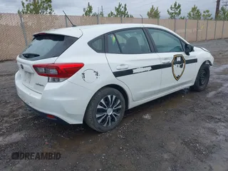 2021 Subaru Impreza with VIN 4S3GTAB6XM3705793, listed as a IAAI auction lot 41895201 with 77,254 mi miles and . Bid and sale history available at DreamBid. Image 4.