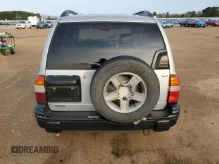 2004 Chevrolet Tracker LT z VIN 2CNBE634X46900683, wystawiony jako Copart lot #88601815 z przebiegiem 146 915 mil mil oraz Szkoda całkowita • Salvage title. Historia ofert i sprzedaży dostępna na DreamBid. Obrazek 6.