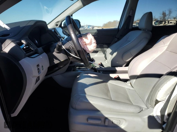 2019 Honda Pilot Elite with VIN 5FNYF6H0XKB059988, listed as a Copart auction lot 74472194 with 63,742 mi miles and Salvage title. Bid and sale history available at DreamBid. Image 7.