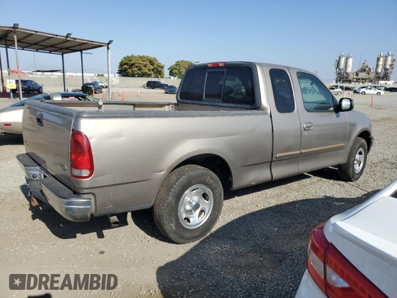 2002 Ford F-150 XL z VIN 1FTRX17232KC51909, wystawiony jako Copart lot #62081725 z przebiegiem Nie podano mil oraz Czysty tytuł • Clean title. Historia ofert i sprzedaży dostępna na DreamBid. Obrazek 3.