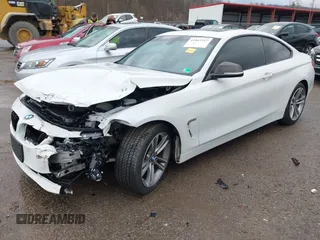 2014 BMW 4 Series 428i with VIN WBA3N3C58EF712202, listed as a IAAI auction lot 41843517 with 90,958 mi miles and . Bid and sale history available at DreamBid. Image 2.